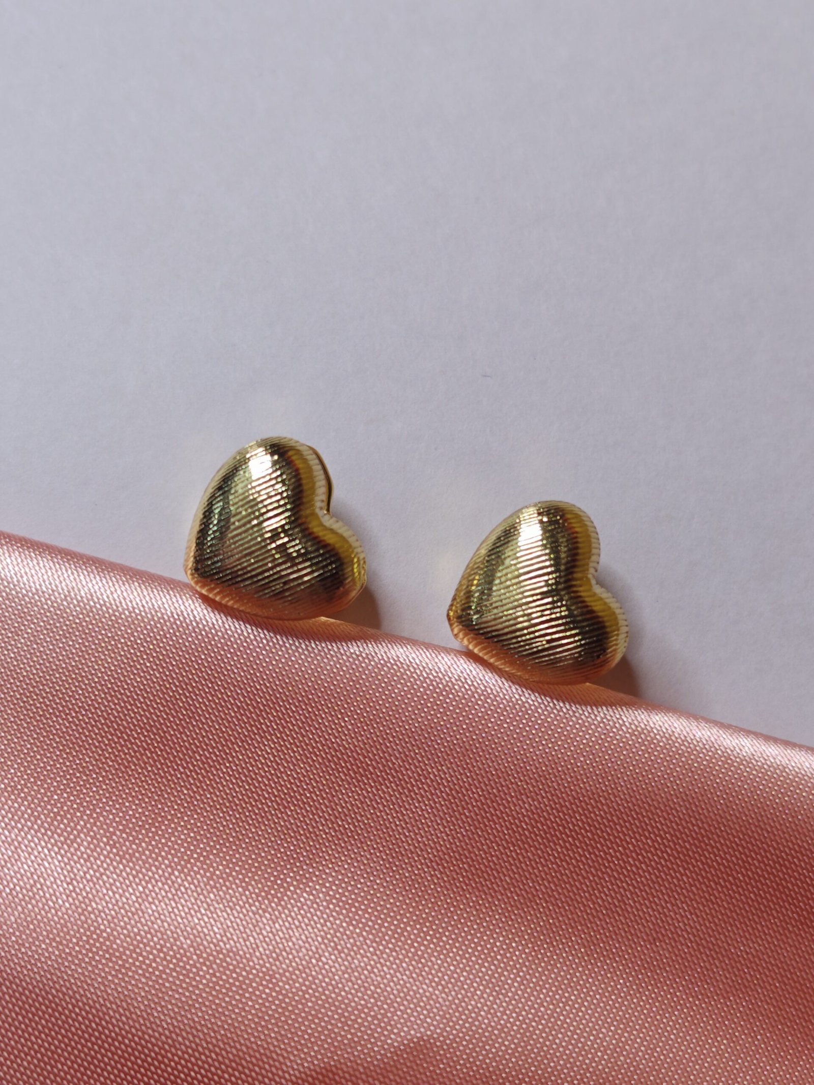 Aretes de corazón doble faz